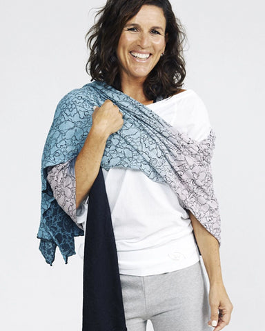 chic calm scarf on model smiling close up