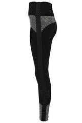 Cut out image of Adaptive Dream Spin Leggings side view showing adaptive feature tape on outer leg