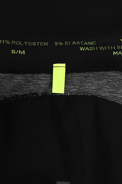 Close up image of adaptive feature bright tab at back inner waistband to show which is back and which is front 