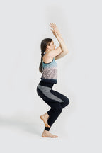 Chic Calm Yoga full suit on lady doing yoga