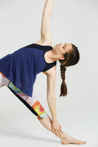 model doing yoga wearing Steffi Capri Leggings