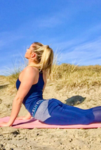 model doing yoga on beach wearing No Sweat Set 