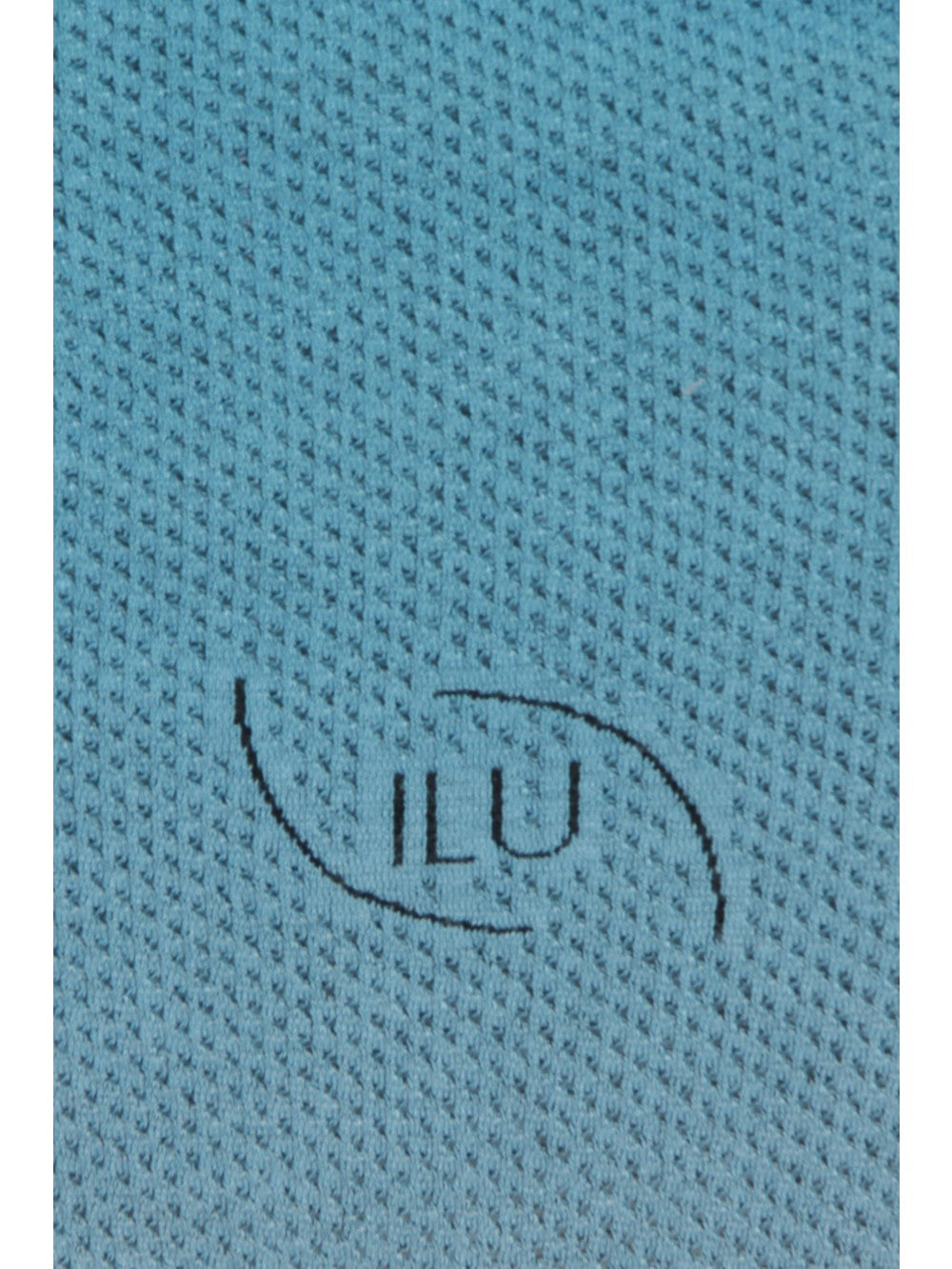 Chic Calm Yoga Tank close up of logo