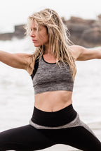 blonde model doing yoga pose wearing Motivate Me Crop