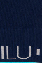 Motivate Me Vest hem band detail with sky blue accent and ILU branding — ILU Fitwear