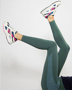 motivate me leggings green on model legs